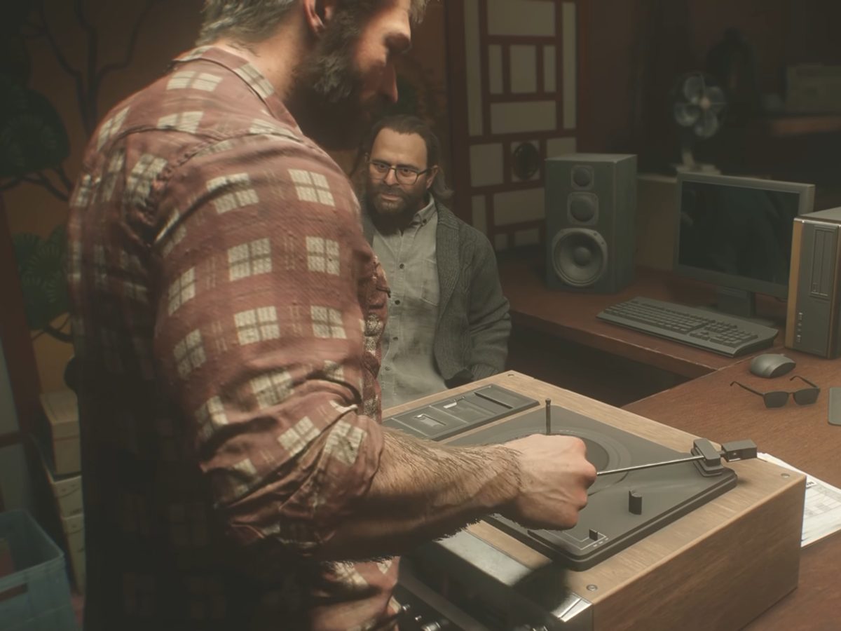 Marvel's Wolverine: Logan at a record player in a cluttered office